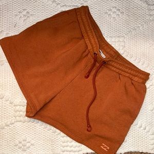 Billabong burnt orange sweatshort size medium